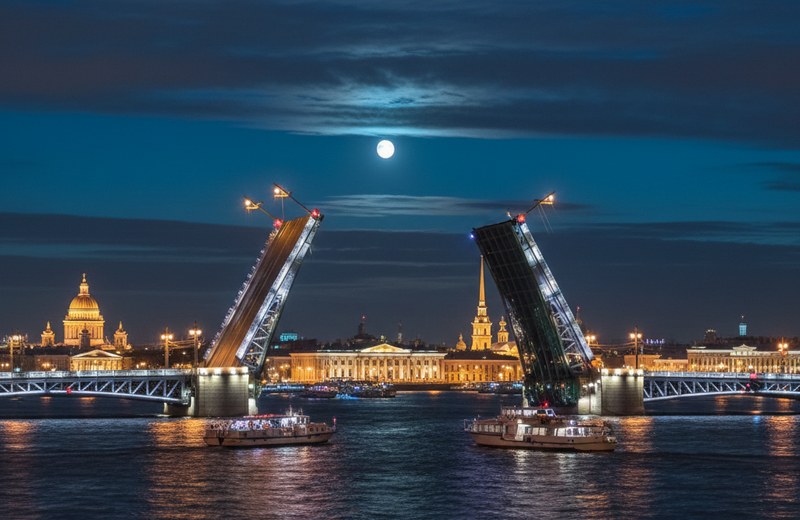 Литейный мост ночью с разведёнными пролётами над Невой